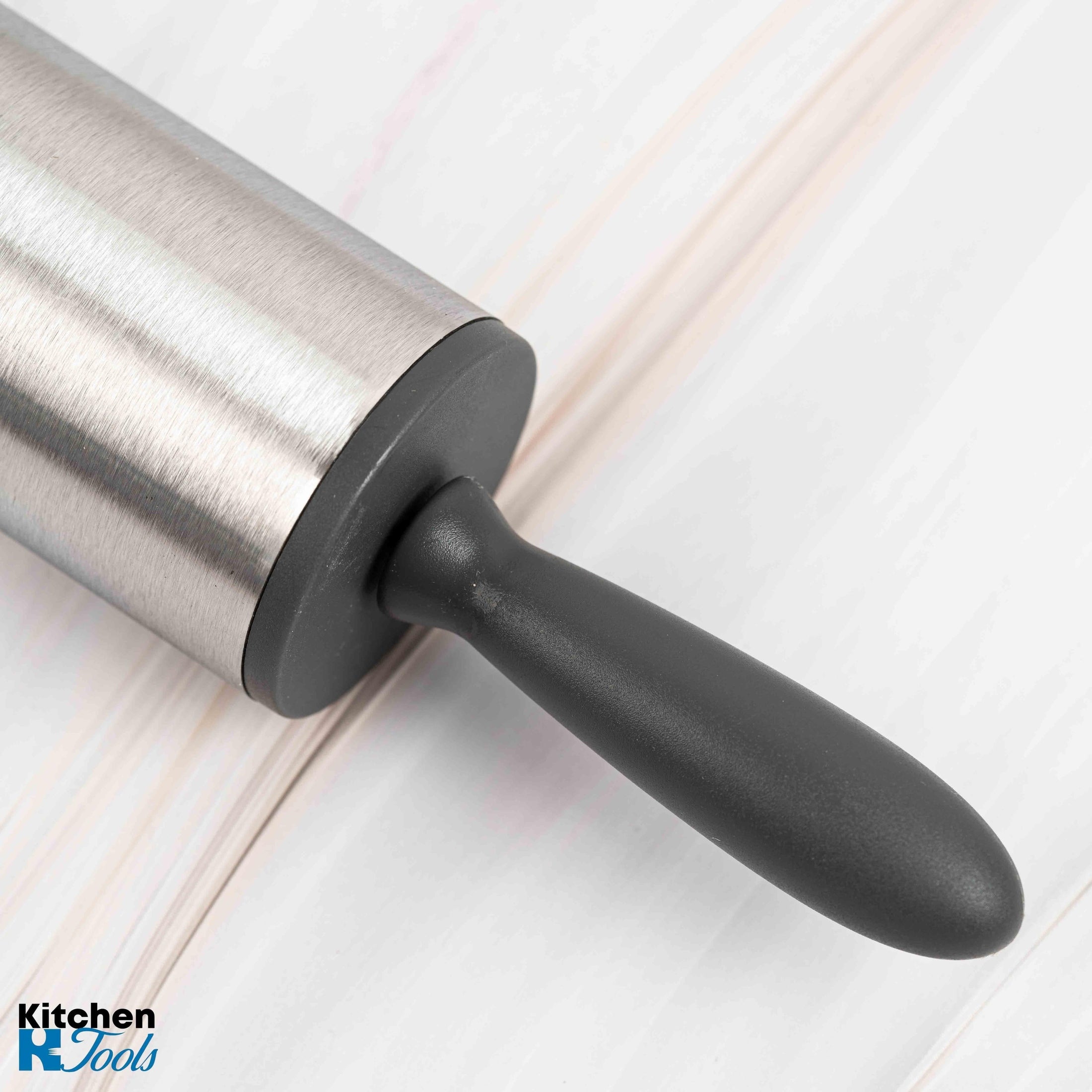 Sucitor inoxidabil cu mânere albastre